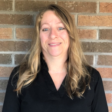 Team member supporting small businesses with operation and administrative services at Padgett Traverse City,